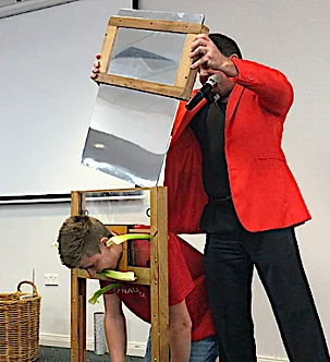 FA89629BEE04F95E.png Glenn Keeley has people losing their heads of his comes magic show